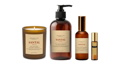 Santal Desire collection, amber glass lotion, mist and roller with matte Amber Sand labels
