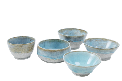 Five blue-glazed dragonfruit clay bowls in graduated sizes grouped together
