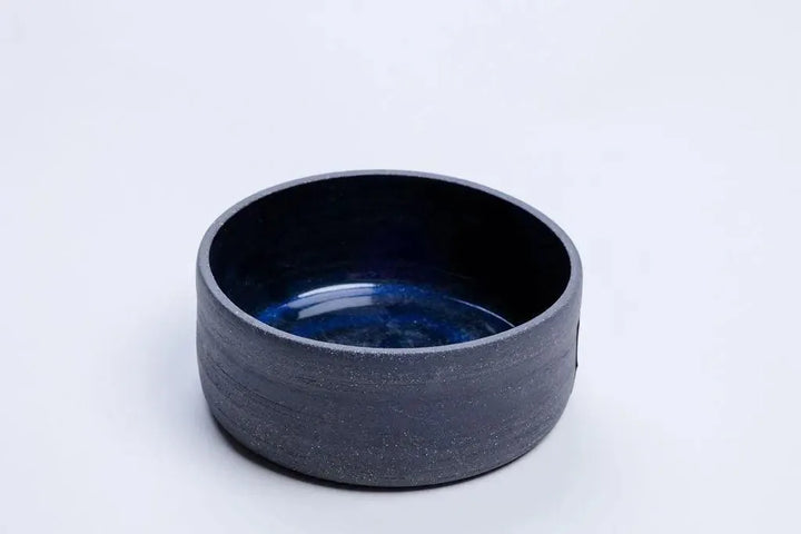 Dark blue glazed 14 oz ceramic vessel with grey stoneware exterior