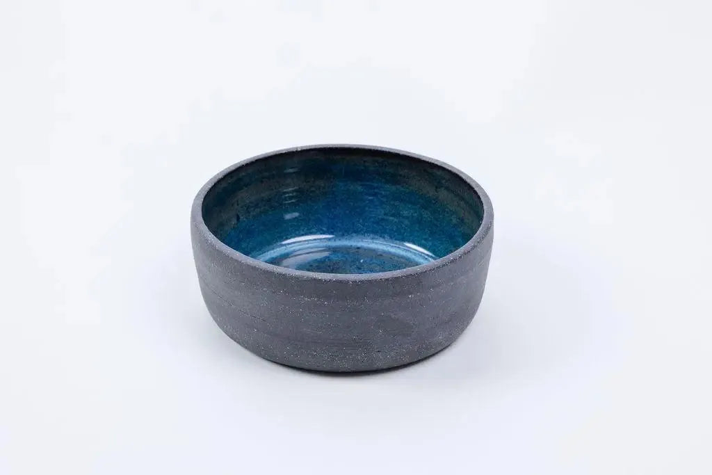 Light blue glazed 14 oz ceramic vessel with grey stoneware exterior