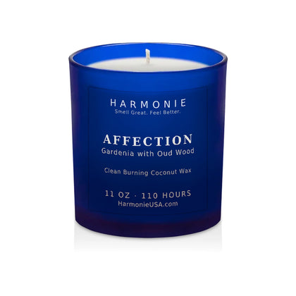 Harmonie Affection coconut wax candle, 11 oz, 125 hour burn time, frosted sapphire blue glass vessel with a single wick, unlit, on a white background
