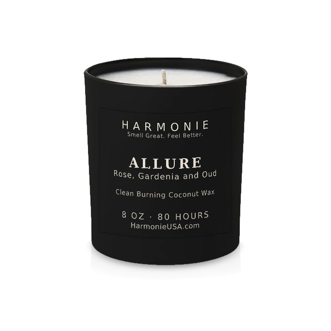 Harmonie Allure coconut wax candle, 8 oz, 80 hour burn time, matte black glass vessel with a single wick, unlit, on a white background