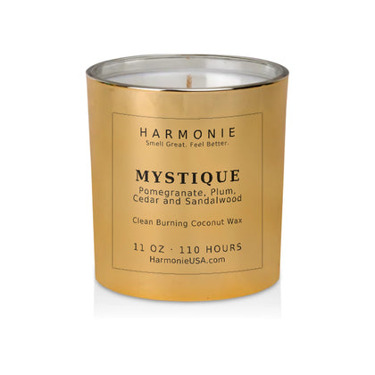Harmonie Mystique coconut wax candle, 11 oz, 125 hour burn time, electroplated gold glass vessel with a single wick, unlit, on a white background