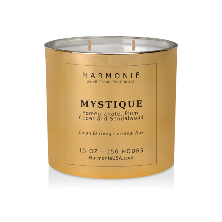Harmonie Mystique coconut wax candle, 15 oz, 150 hour burn time, electroplated gold glass vessel with two wicks, unlit, on a white background