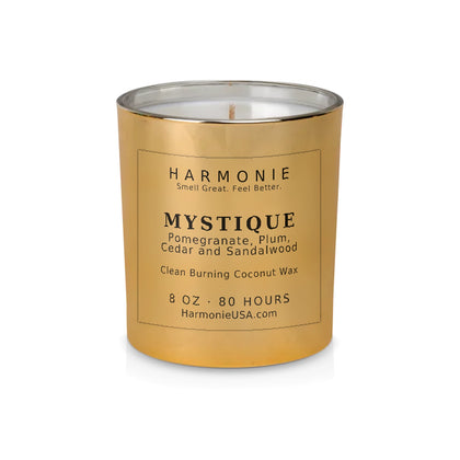 Harmonie Mystique coconut wax candle, 8 oz, 80 hour burn time, electroplated gold glass vessel with a single wick, unlit, on a white background