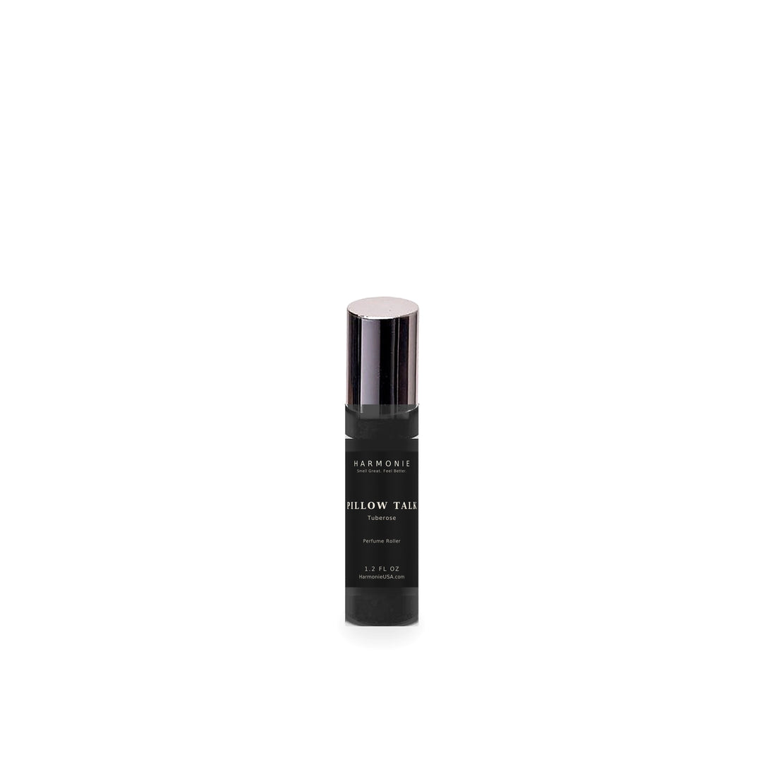 Harmonie Pillow Talk 1.2 oz perfume roller, Tuberose, matte black glass roller bottle on a white background