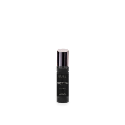 Harmonie Pillow Talk 1.2 oz perfume roller, Tuberose, matte black glass roller bottle on a white background