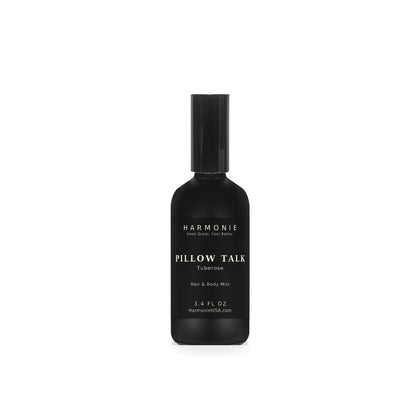 Harmonie Pillow Talk 3.4 oz hair and body mist, tuberose, matte black glass spray bottle on a white background