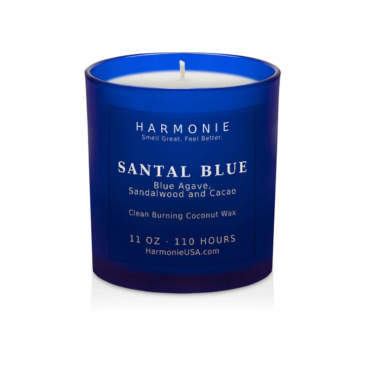 Harmonie Santal Blue coconut wax candle, 11 oz, 125 hour burn time, frosted sapphire blue glass vessel with a single wick, unlit, on a white background