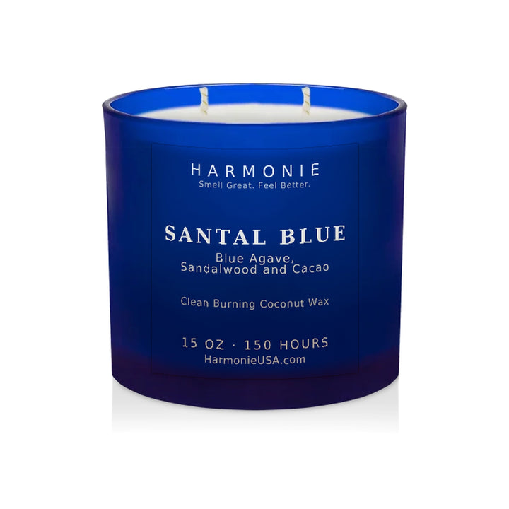 Harmonie Santal Blue coconut wax candle, 15 oz, 150 hour burn time, frosted sapphire blue glass vessel with two wicks, unlit, on a white background