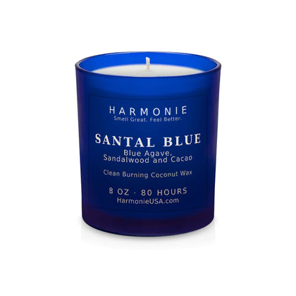 Harmonie Santal Blue coconut wax candle, 8 oz, 80 hour burn time, frosted sapphire blue glass vessel with a single wick, unlit, on a white background
