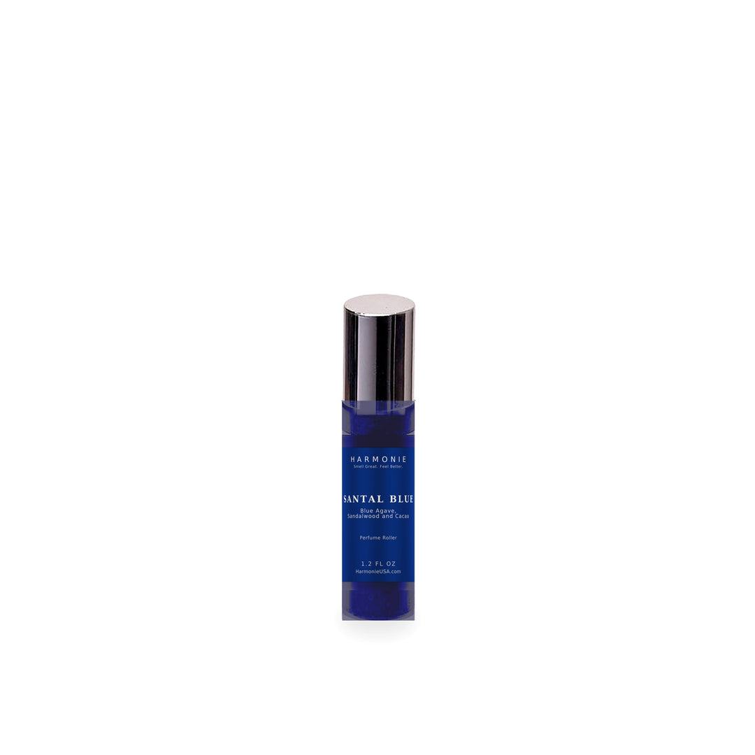 Harmonie Santal Blue 1.2 oz perfume roller, Blue Agave, Sandalwood and Cacao, sapphire blue glass roller bottle on a white background