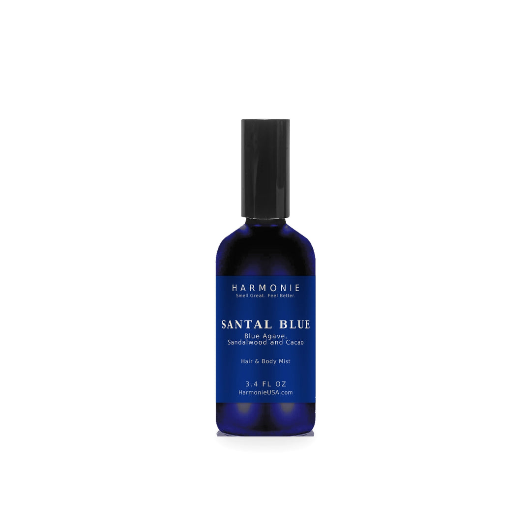 Harmonie Santal Blue 3.4 oz hair and body mist, blue agave, sandalwood and cacao, sapphire blue glass spray bottle on a white background
