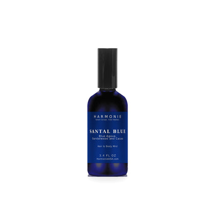 Harmonie Santal Blue 3.4 oz hair and body mist, blue agave, sandalwood and cacao, sapphire blue glass spray bottle on a white background