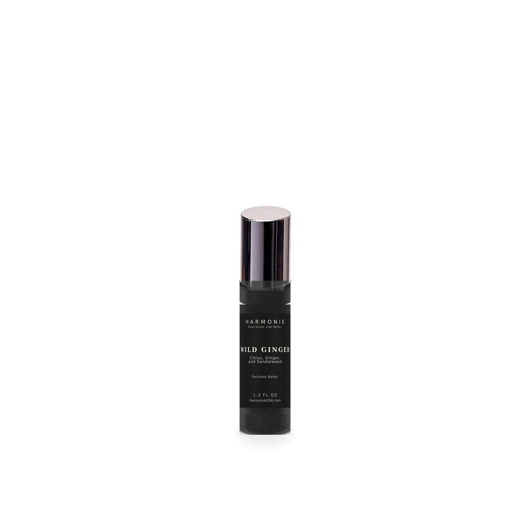 Harmonie Wild Ginger 1.2 oz perfume roller, Citrus, Ginger, and Sandalwood, matte black glass roller bottle on a white background