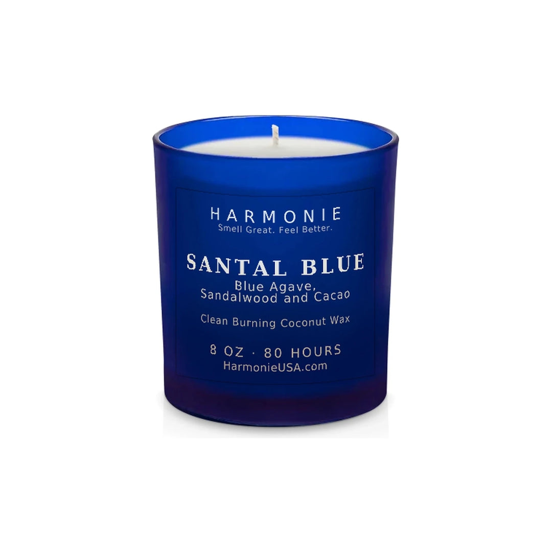 Harmonie Santal Blue coconut wax candle, 8 oz, 80 hour burn time, frosted sapphire blue glass vessel with a single wick, unlit, on a white background