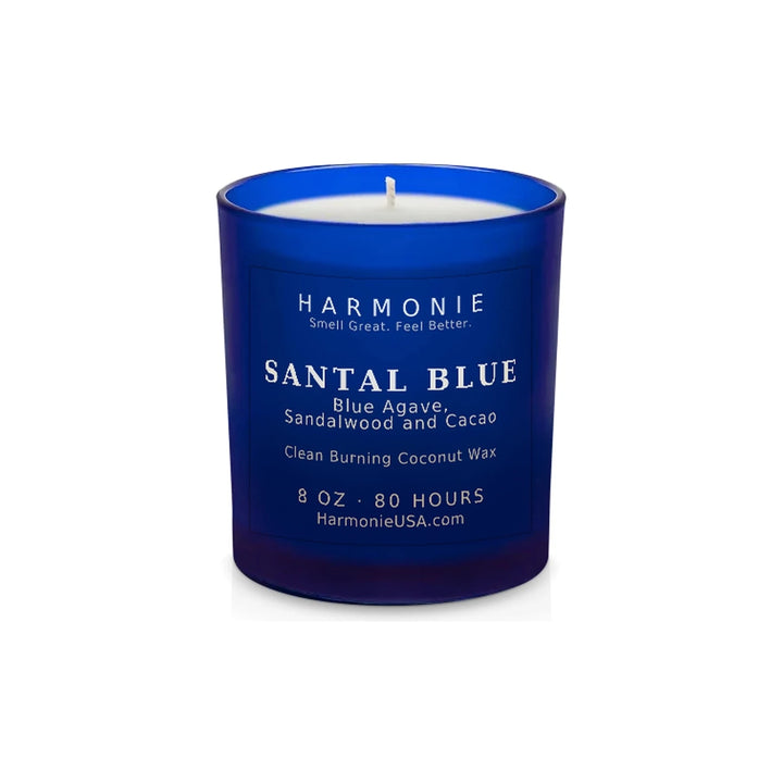 Harmonie Santal Blue coconut wax candle, 8 oz, 80 hour burn time, frosted sapphire blue glass vessel with a single wick, unlit, on a white background