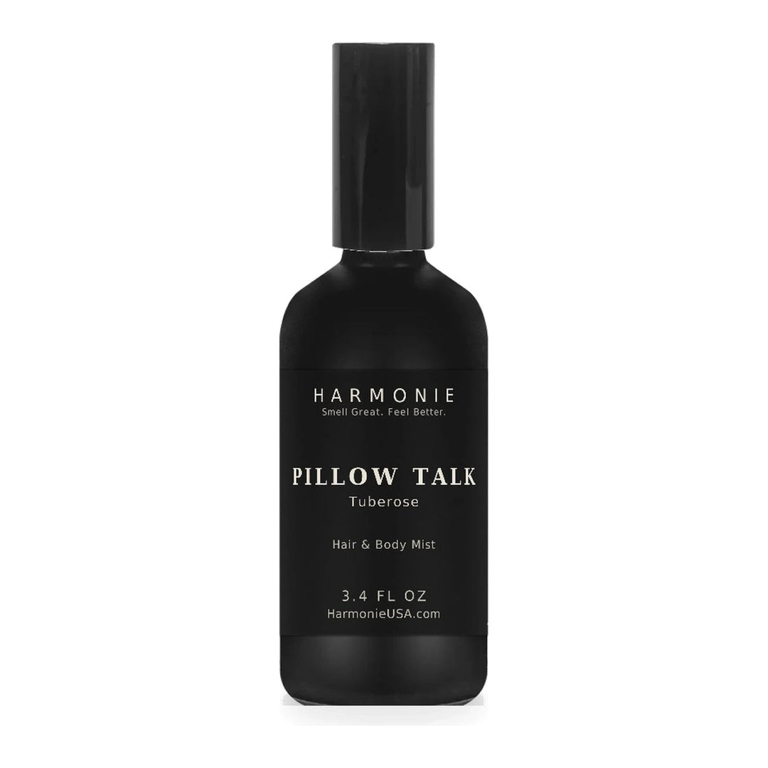 Harmonie Pillow Talk 3.4 oz hair and body mist, tuberose, matte black glass spray bottle on a white background