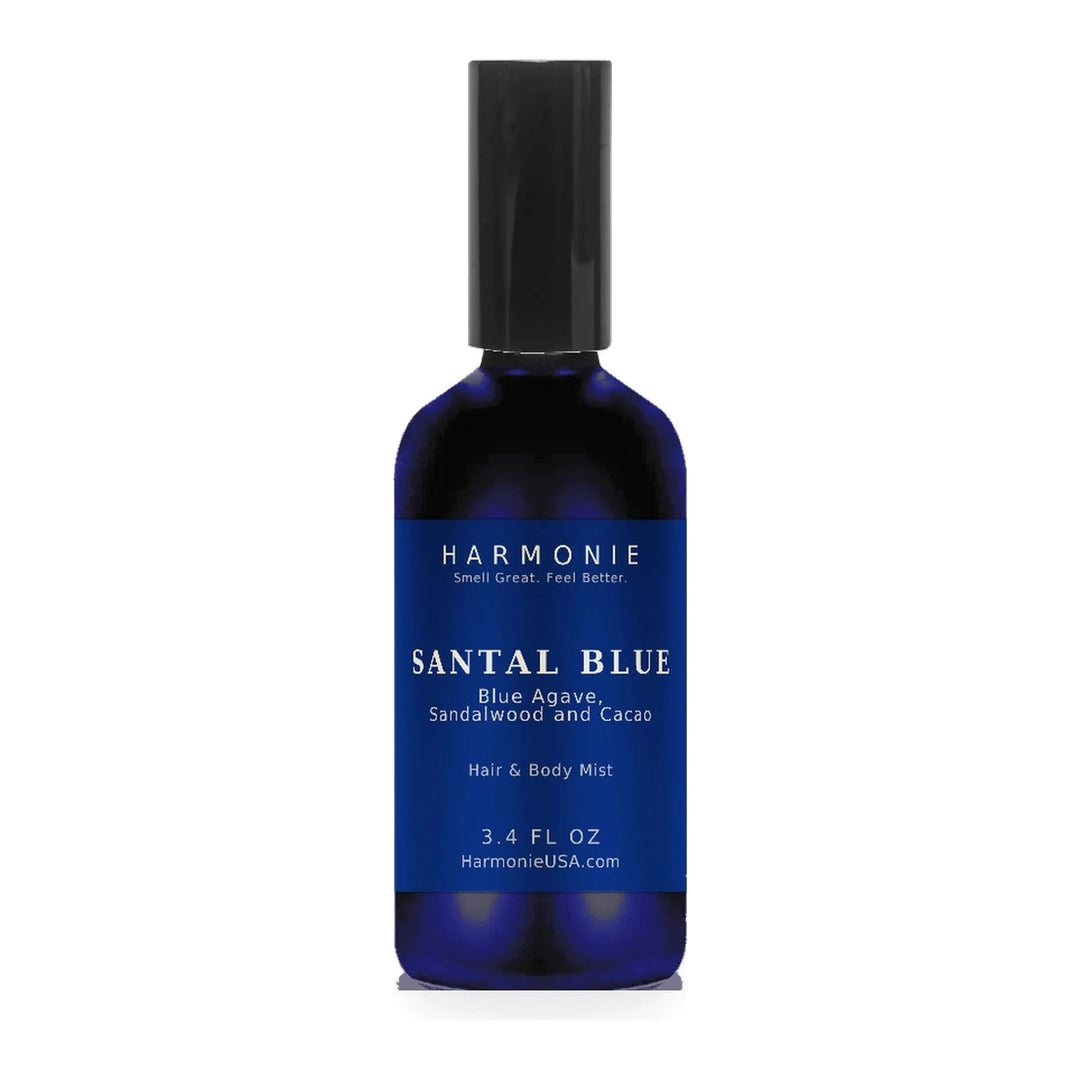 Harmonie Santal Blue 3.4 oz hair and body mist, blue agave, sandalwood and cacao, sapphire blue glass spray bottle on a white background