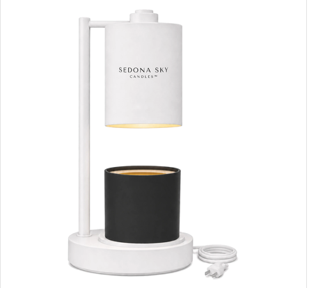 Sedona Sky Candles matte white candle warmer lamp, flameless, with a black coconut wax candle on the base and a coiled white power cord, on a pure white background