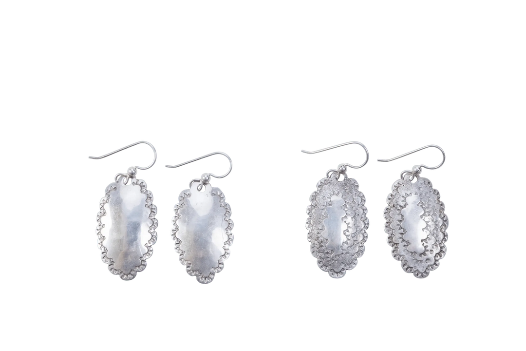 Two pairs of simple-style Roosevelt dime earrings side by side on a plain ground