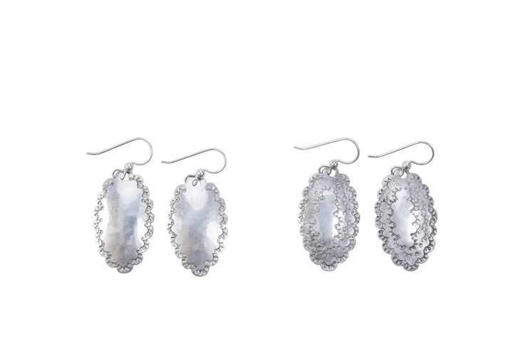 Two pairs of simple-style Roosevelt dime earrings side by side on a plain ground