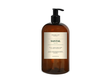 Santal Desire hand and body lotion in a 16 oz amber bottle with a matte Amber Sand label