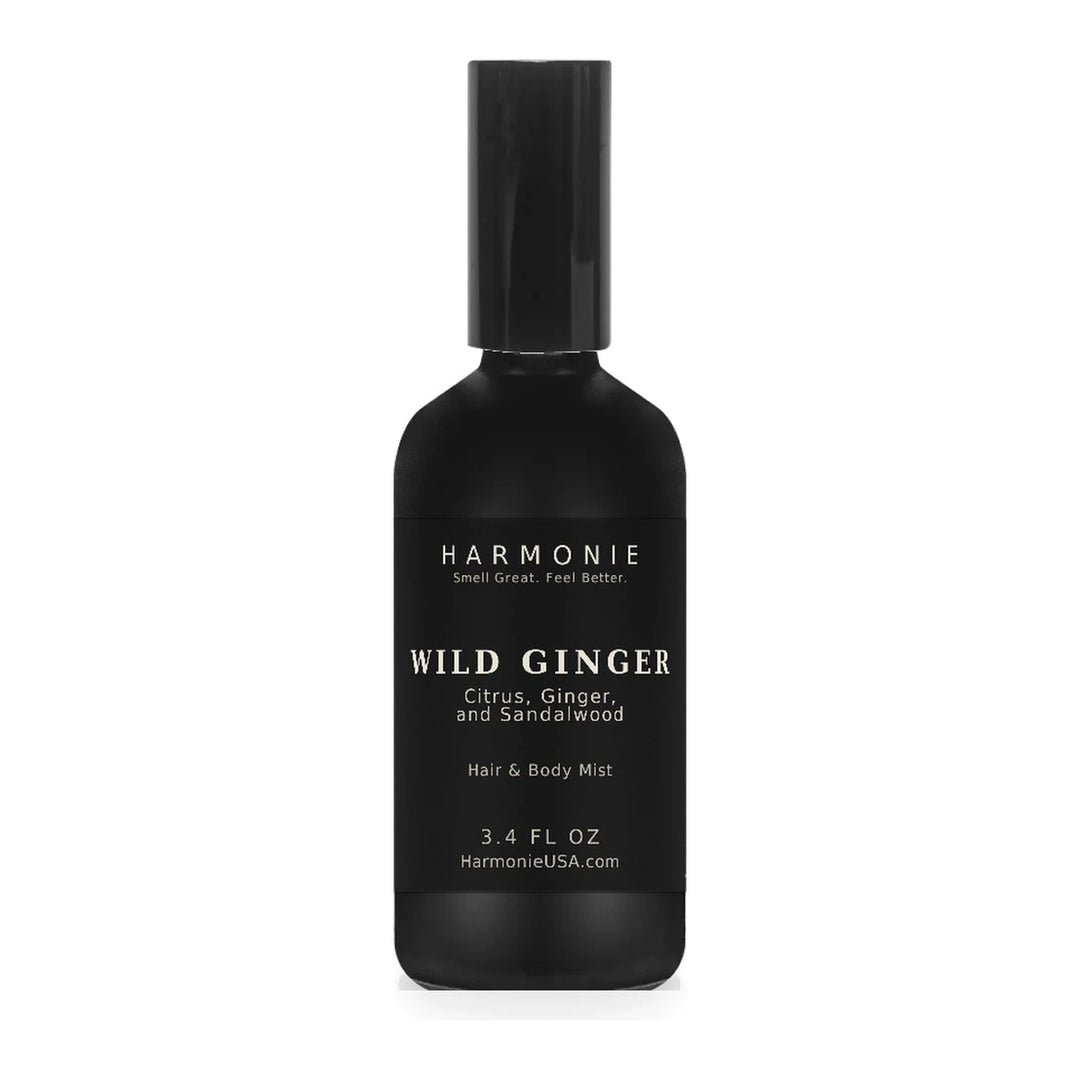Harmonie Wild Ginger 3.4 oz hair and body mist, citrus, ginger, and sandalwood, matte black glass spray bottle on a white background