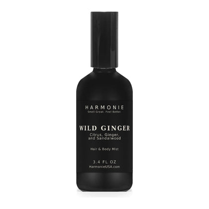 Harmonie Wild Ginger 3.4 oz hair and body mist, citrus, ginger, and sandalwood, matte black glass spray bottle on a white background
